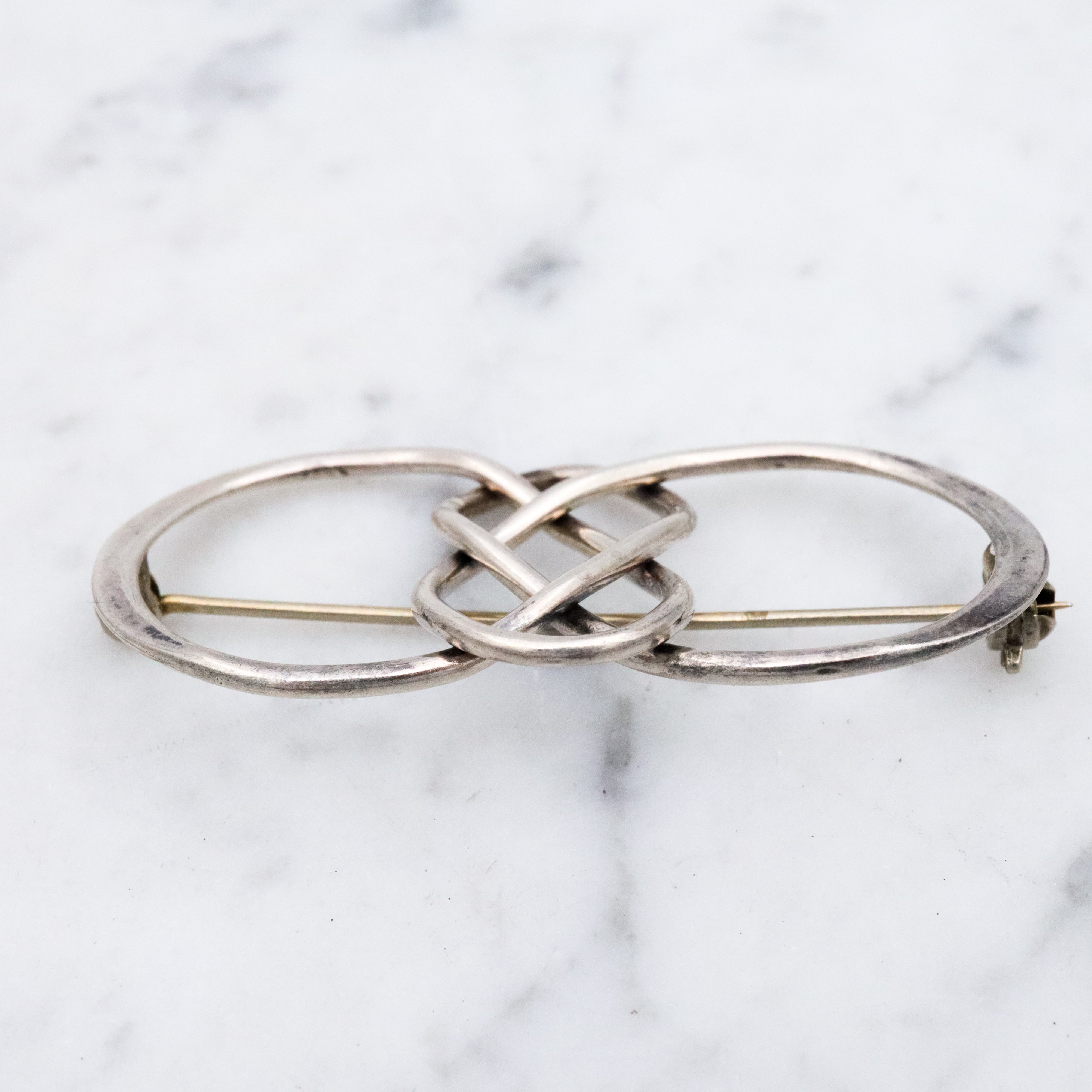 Vintage sterling elongated celtic knot brooch